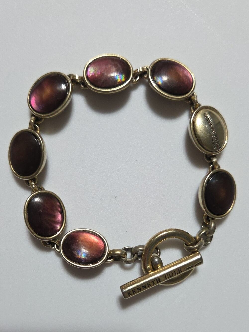 Kenneth Cole New York Gold Tone Iridescent Glass Cabochon Toggle Bracelet
